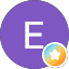 A purple circle with a white letter "E" in the center and a small, multicolored star badge at the bottom right.