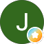 A green circle with a white letter "J" in the center; a small badge with a white star in a blue and orange circle is at the bottom right.
