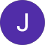 A white letter "J," representing Jhonattan Lamus, is centered on a solid purple circular background.
